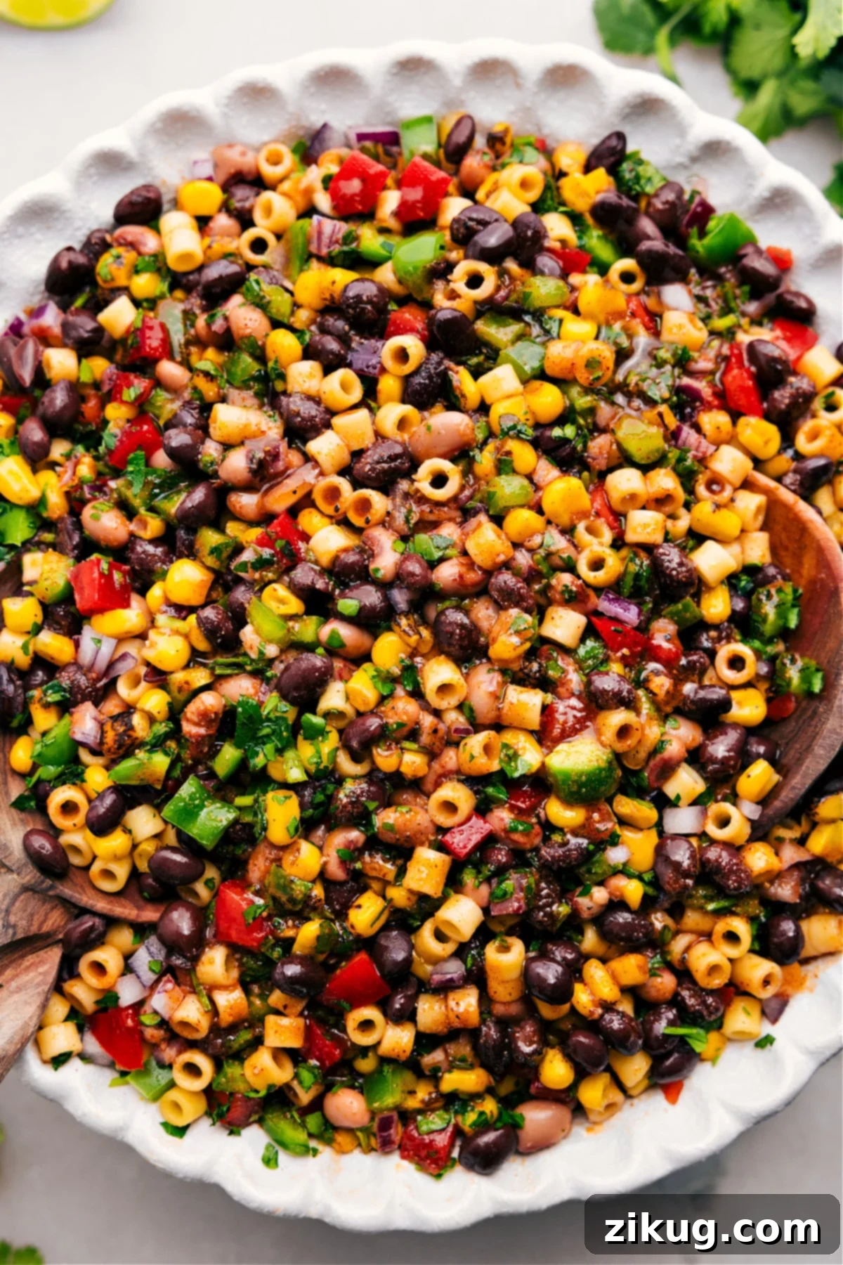 Delicious Cowboy Caviar Pasta Salad Recipe A vibrant bowl of Cowboy Caviar Pasta Salad, perfectly dressed and tossed, showcasing fresh ingredients and colorful pasta.
