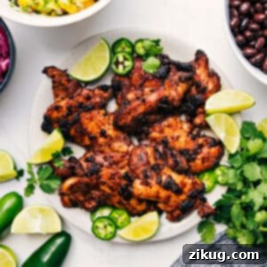 The finished Jerk Chicken dish, moist and perfectly spiced, ready for serving.