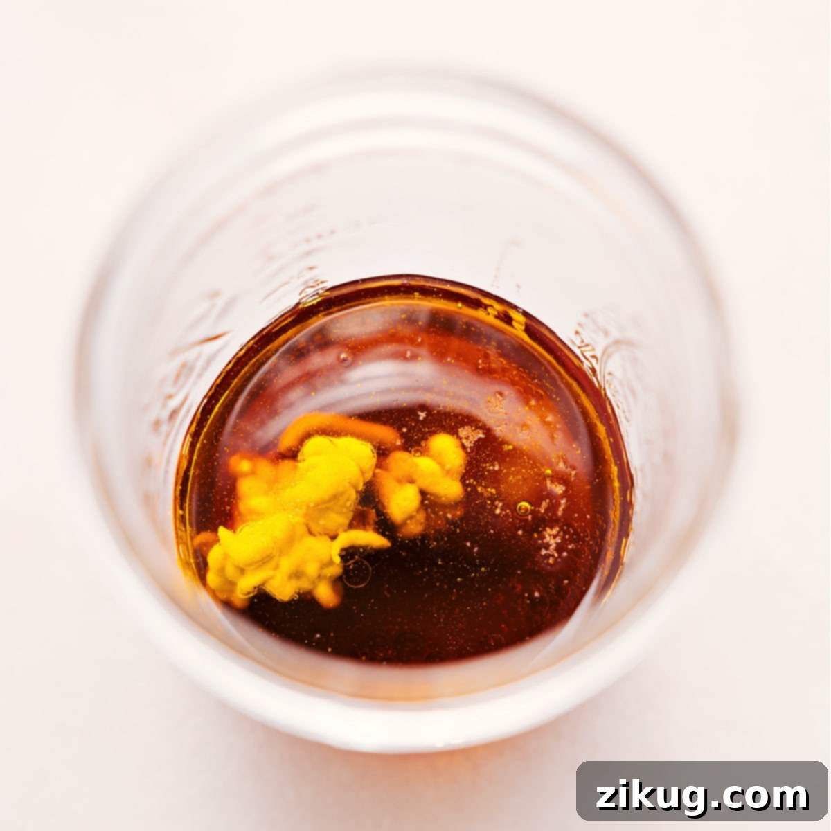 All the vibrant ingredients for White Balsamic Vinaigrette are thoughtfully combined in a mason jar, perfectly ready for a quick shake to emulsify.