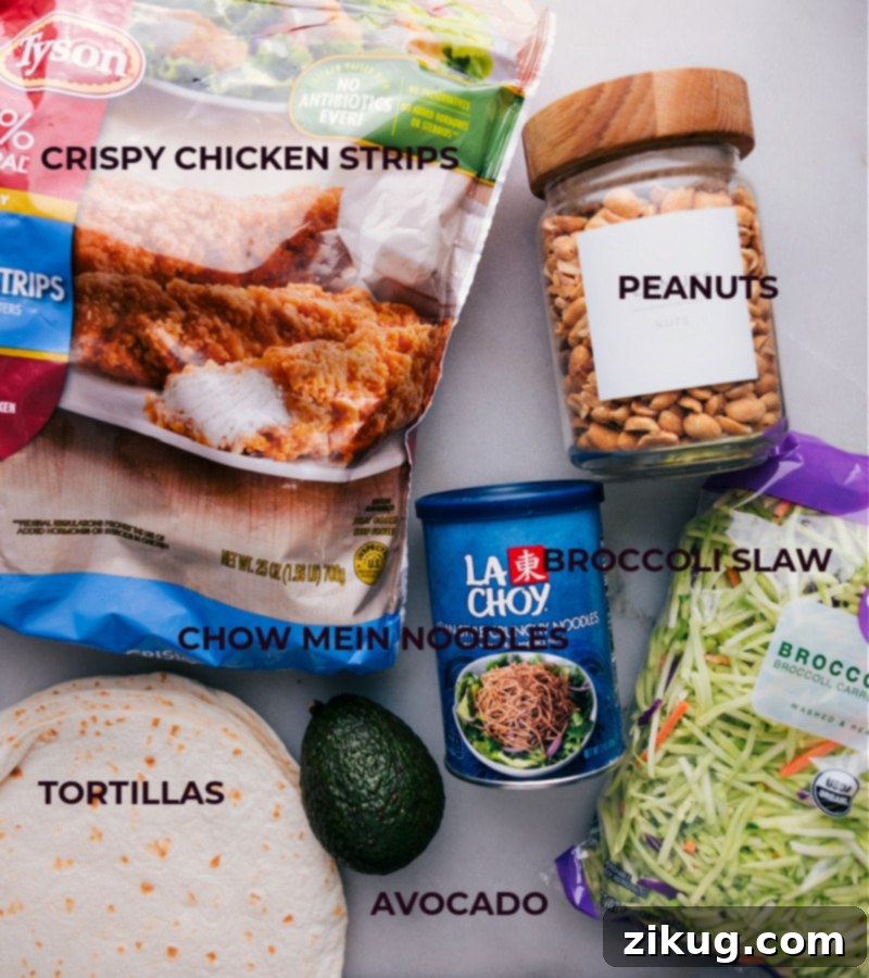 Ready-to-Assemble Ingredients for Your Asian Chicken Wraps All the prepped ingredients for the Asian Chicken Wraps recipe are laid out neatly on a counter, ready for assembly.