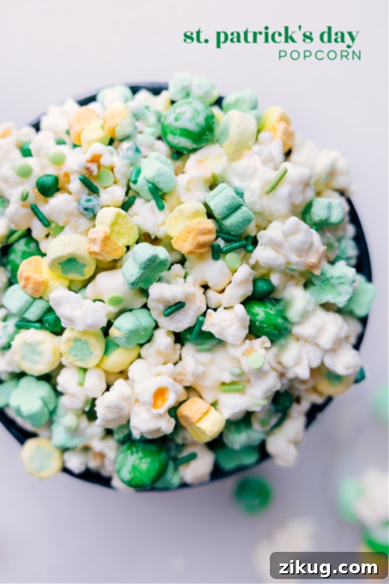 Overhead image of the St. Patrick's Day Popcorn with green, white, and gold accents, ready to be served in a bowl.