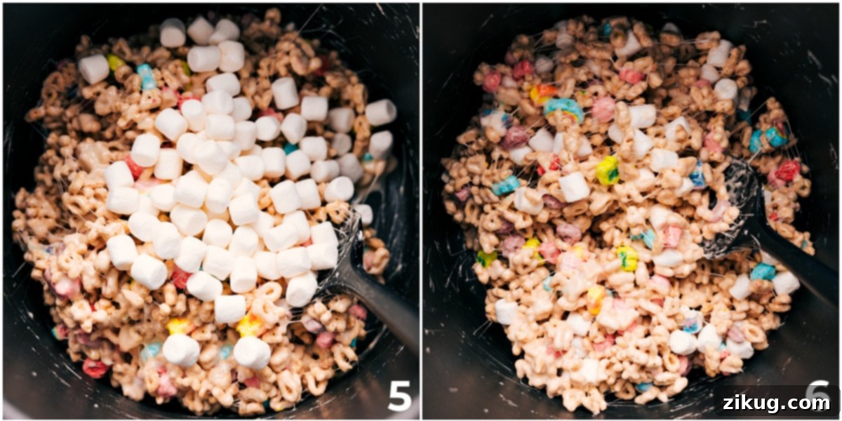 The vibrant Lucky Charms mixture stirred together, with extra marshmallows added for a delightful visual and textural contrast.