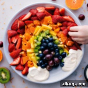 A close-up image of the Fruit Rainbow Tray with the creamy dip at the bottom.