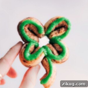 Lucky Shamrock Swirl Buns 2 Shamrock Cinnamon Rolls with green icing and sanding sugar