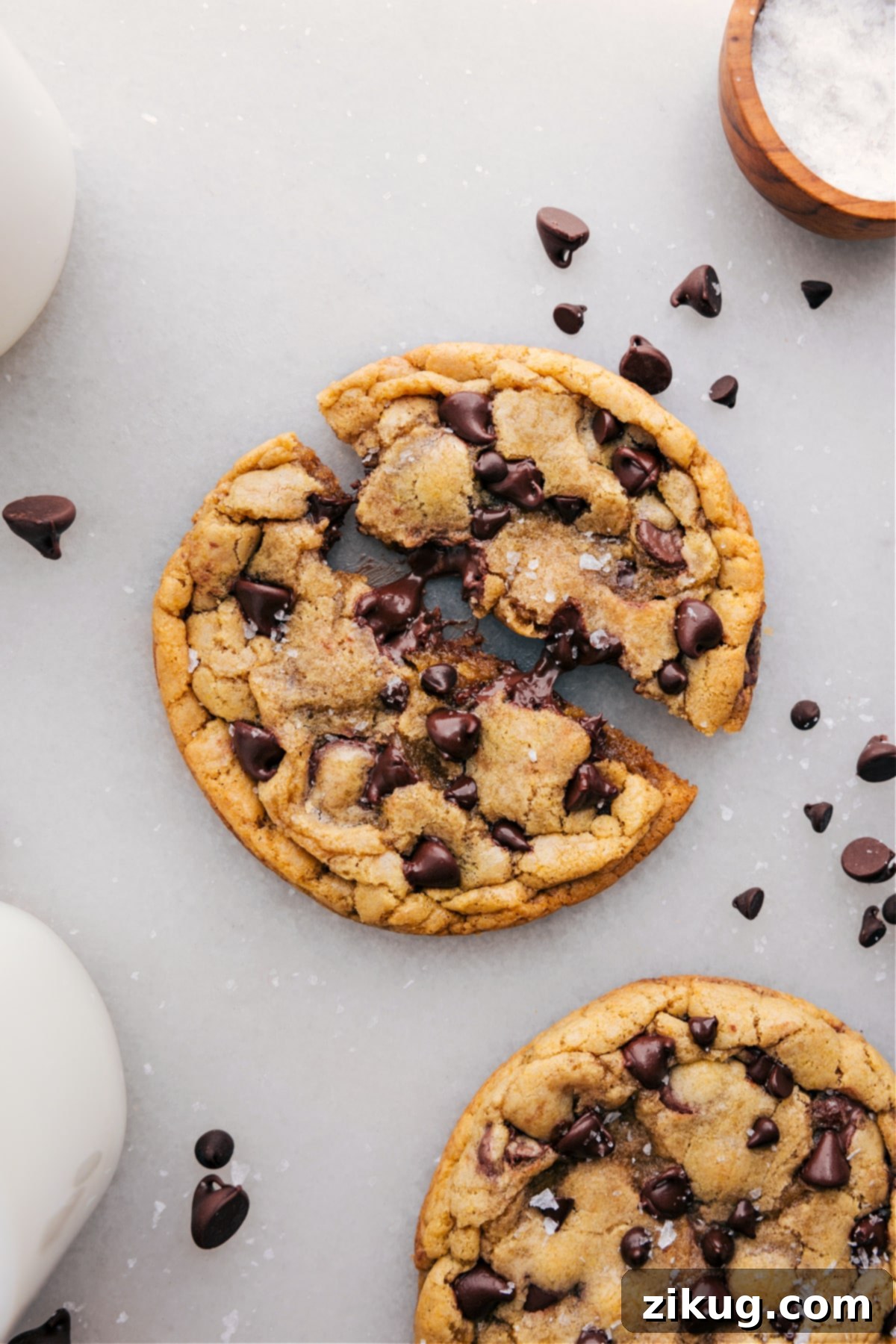 Single Serve Chocolate Chip Cookie Recipe Single serve chocolate chip cookie recipe broken apart showing the gooey, delicious inside.