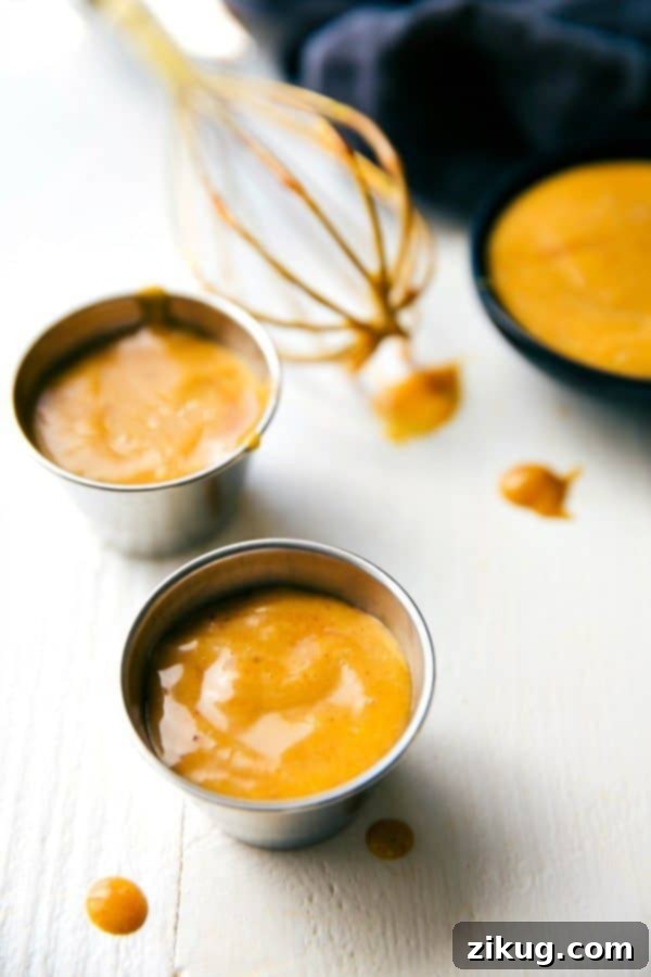 Recreate the beloved Chick-Fil-A Sauce at home with this simple 3-ingredient recipe. Enjoy its creamy, sweet, tangy, and smoky flavors! #chickfila #sauce #homemade #easyrecipe #copycat Three cups of homemade Chick-Fil-A Sauce