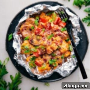 Hearty Creamy Sweet Potato and Sausage 2 A perfectly cooked Creamy Sweet Potato and Sausage Foil Pack, ready to be served.