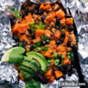 Taco Sweet Potato Foil Packets with a medley of colorful ingredients.