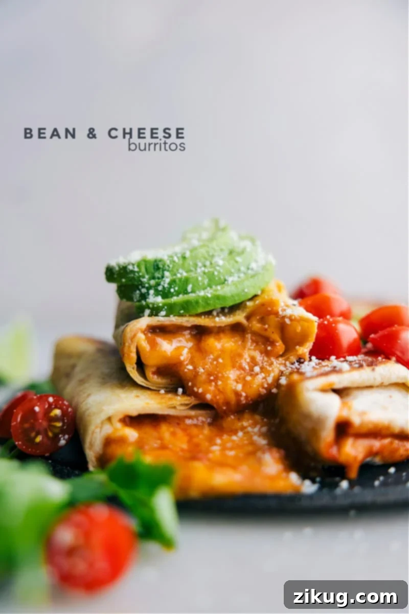 Easy Homemade Bean and Cheese Burritos: Quick, Family-Friendly, and Packed with Flavor Image of Bean and Cheese Burritos, golden brown and topped with fresh cilantro