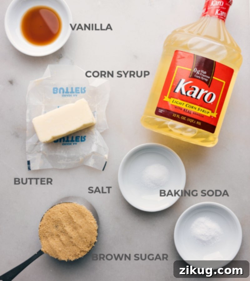 Make caramel corn the quick and easy way. Quick and Easy Microwave Caramel Corn is a delicious shortcut that yields the salty-sweet treat we all crave! Recipe via chelseasmessyapron.com #dessert #quick #easy #simple #familyfriendly #movienight #treats #microwave #caramelcorn A flat lay image displaying all the essential ingredients for making Microwave Caramel Corn, neatly arranged on a counter.