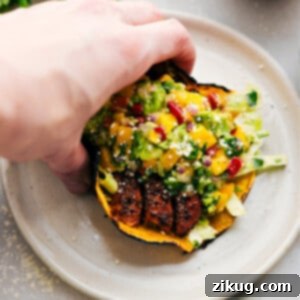 Salmon Tacos on a plate with all the toppings.