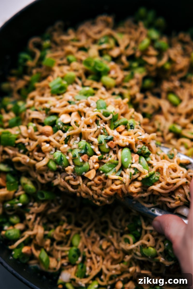 An overhead shot of a freshly prepared bowl of Peanut Butter Ramen, ready to be eaten.