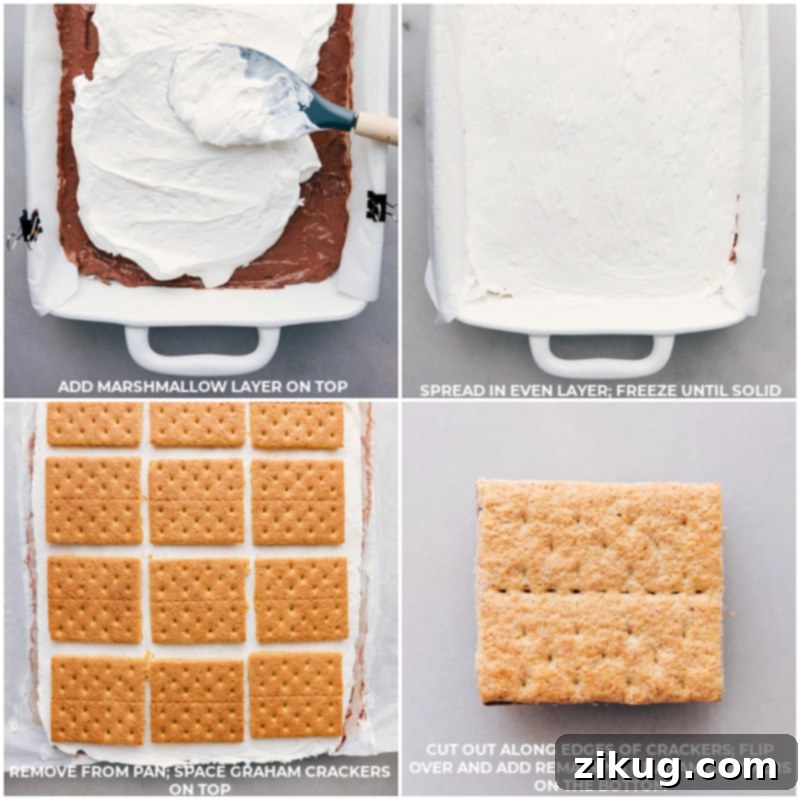 Frozen S'mores bars combine the rich and creamy flavors of chocolate pudding and whipped topping with the sweet, gooey goodness of marshmallow creme, all sandwiched between crispy honey graham crackers. A true sensation during the warmer months, these bars require no baking and are guaranteed to be a hit with both kids and adults! Recipe via chelseasmessyapron #dessert #nobake #treat #best #summerdessert #frozen #smoresbars #smores Process shots of Frozen S'mores bars showing the marshmallow layer being added on top of the chocolate, followed by graham crackers