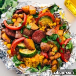 Tin Foil Sausage and Veggies Dinner fresh off the grill ready to be enjoyed.