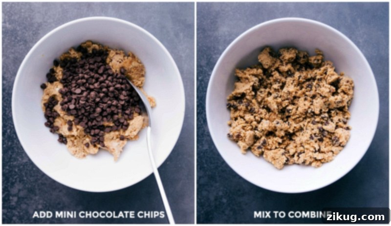 The Final Touch: Incorporating Chocolate Chips into the Energy Bite Dough Hands mixing mini chocolate chips into the cashew and date dough in a bowl for No-Bake Energy Bites
