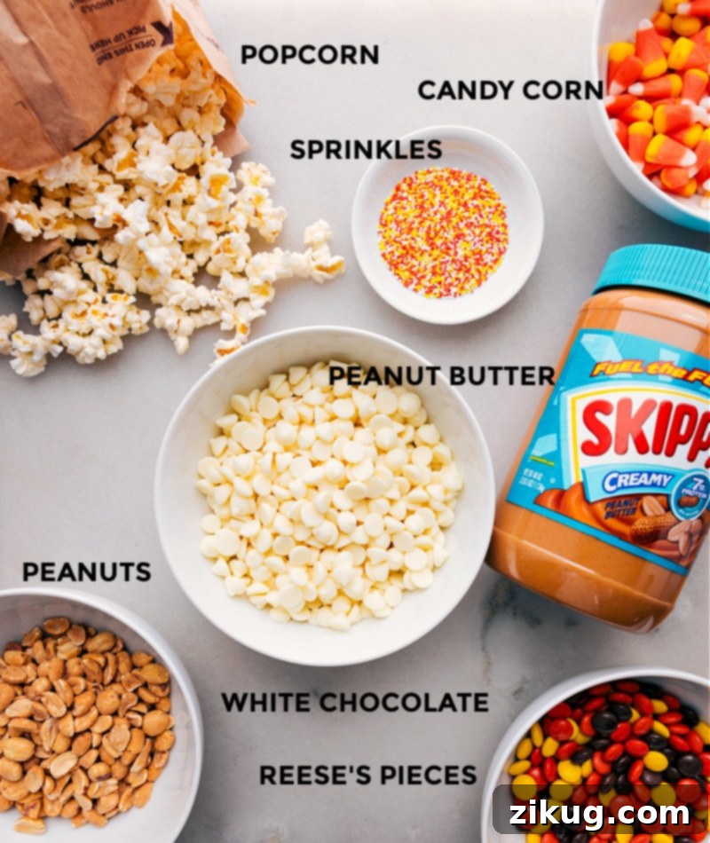 Ingredient shot for Candy Corn Popcorn: popcorn, candy corn, Reese's Pieces, dry-roasted peanuts, white chocolate chips, creamy peanut butter, fine sea salt, and optional Halloween sprinkles. Essential items for a perfect fall snack. #fall #halloween #recipeingredients #snackmaking A beautifully arranged flat lay photograph showcasing all the fresh and colorful ingredients needed to prepare Candy Corn Popcorn. This includes bags of fluffy popcorn, vibrant yellow, orange, and white candy corn, crunchy Reese's Pieces, wholesome dry-roasted peanuts, glistening white chocolate chips, a jar of creamy peanut butter, a small dish of fine sea salt, and a sprinkle of festive Halloween sprinkles, all neatly laid out on a clean kitchen surface, ready for preparation.