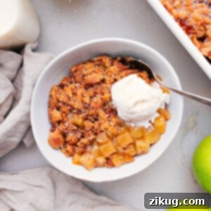 A perfectly baked apple cobbler, golden and inviting, ready for serving.