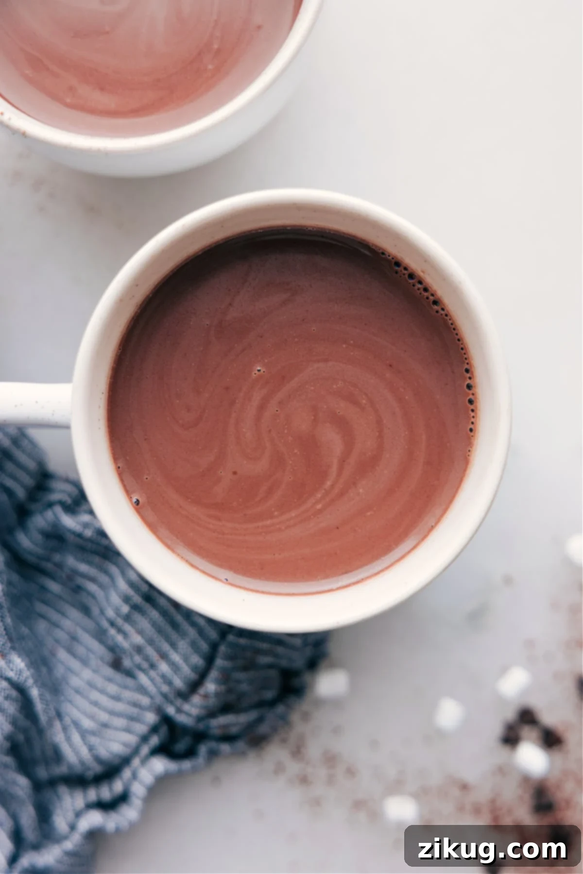 Delightful cup of swirling steaming Crockpot Hot Chocolate A cup of steaming, swirling hot chocolate, perfectly prepared and ready for enjoyment.