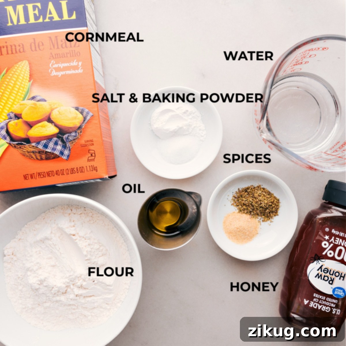 The foundation of flavor: Essential Ingredients for No-Yeast Pizza Dough Ingredients laid out for making No-Yeast Pizza Dough, including flour, baking powder, salt, olive oil, honey, and water.