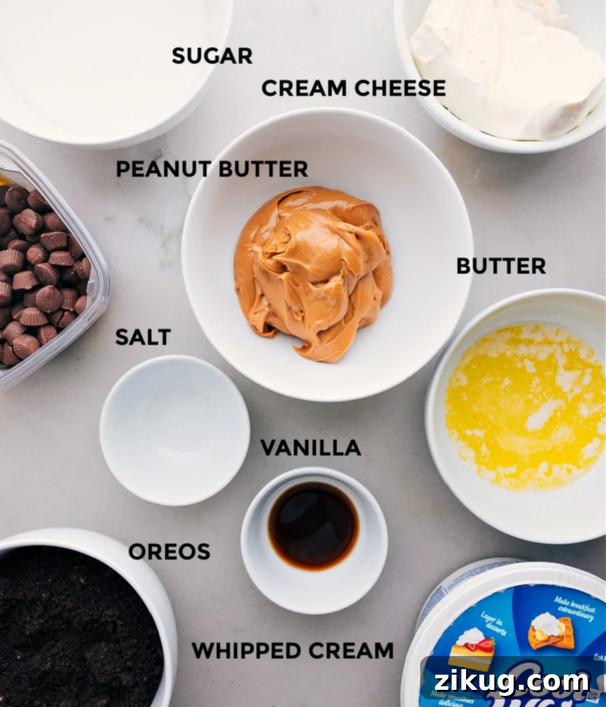All the fresh ingredients for making this homemade peanut butter pie laid out on a table, ready for preparation.