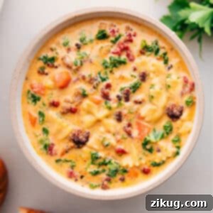A bowl of Italian Sausage Pasta Soup, ready to eat.