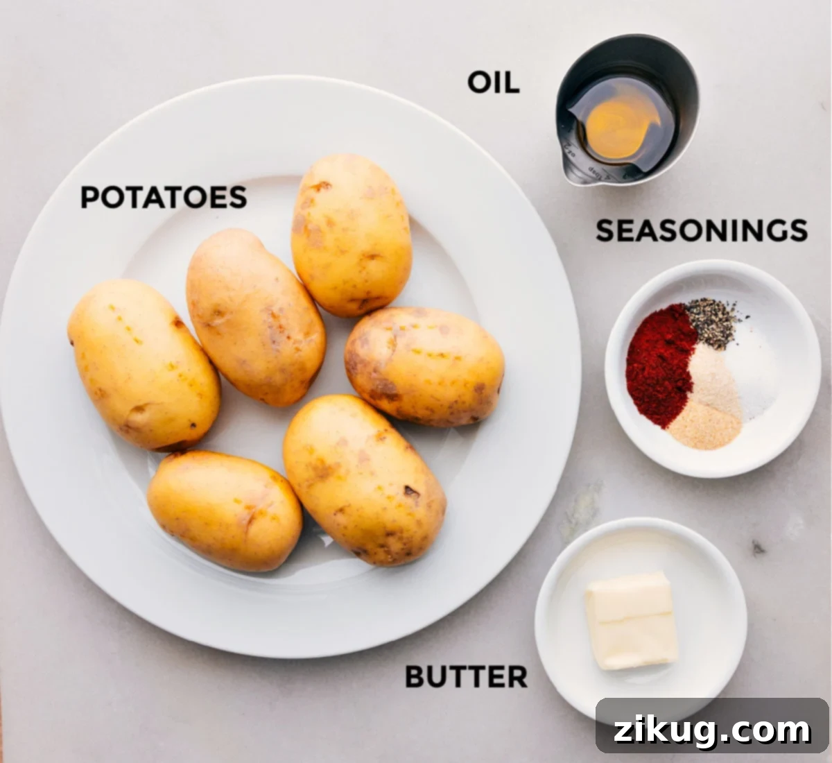 Skillet Breakfast Potatoes Ingredients All the fresh ingredients used in this Skillet Breakfast Potatoes recipe prepped out on a wooden board for easy preparation.
