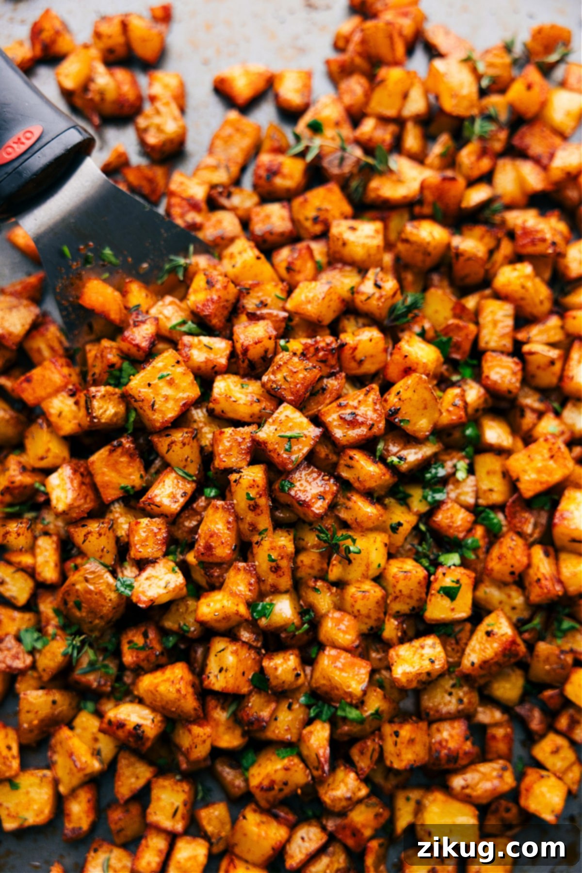 Crispy and golden breakfast potatoes fresh out of the oven, ready to be served.