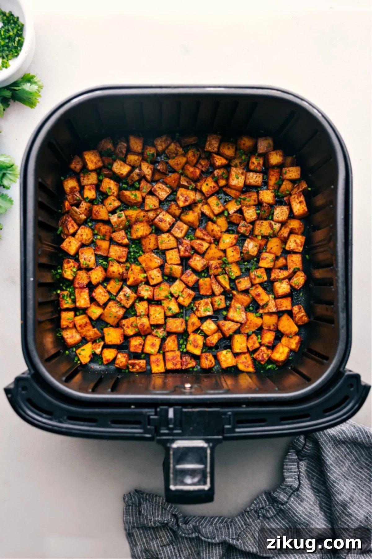 Air Fryer Breakfast Potatoes: Your New Favorite Breakfast Side Freshly made Air Fryer Breakfast Potatoes, golden and crispy, ready to be served.