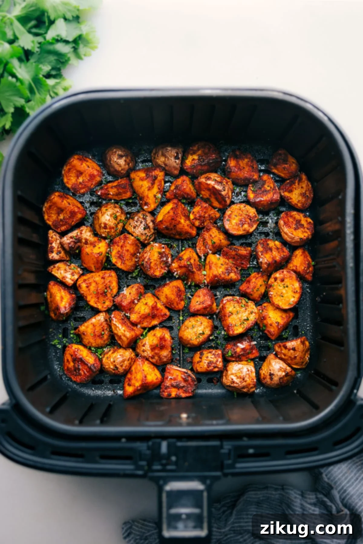 Perfectly Crispy Air Fryer Potatoes Air Fryer Potatoes freshly cooked, golden brown and crispy.