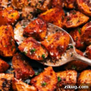 Effortless Crispy Air Fryer Spuds 2 Up close spoonful of the recipe ready to be served.