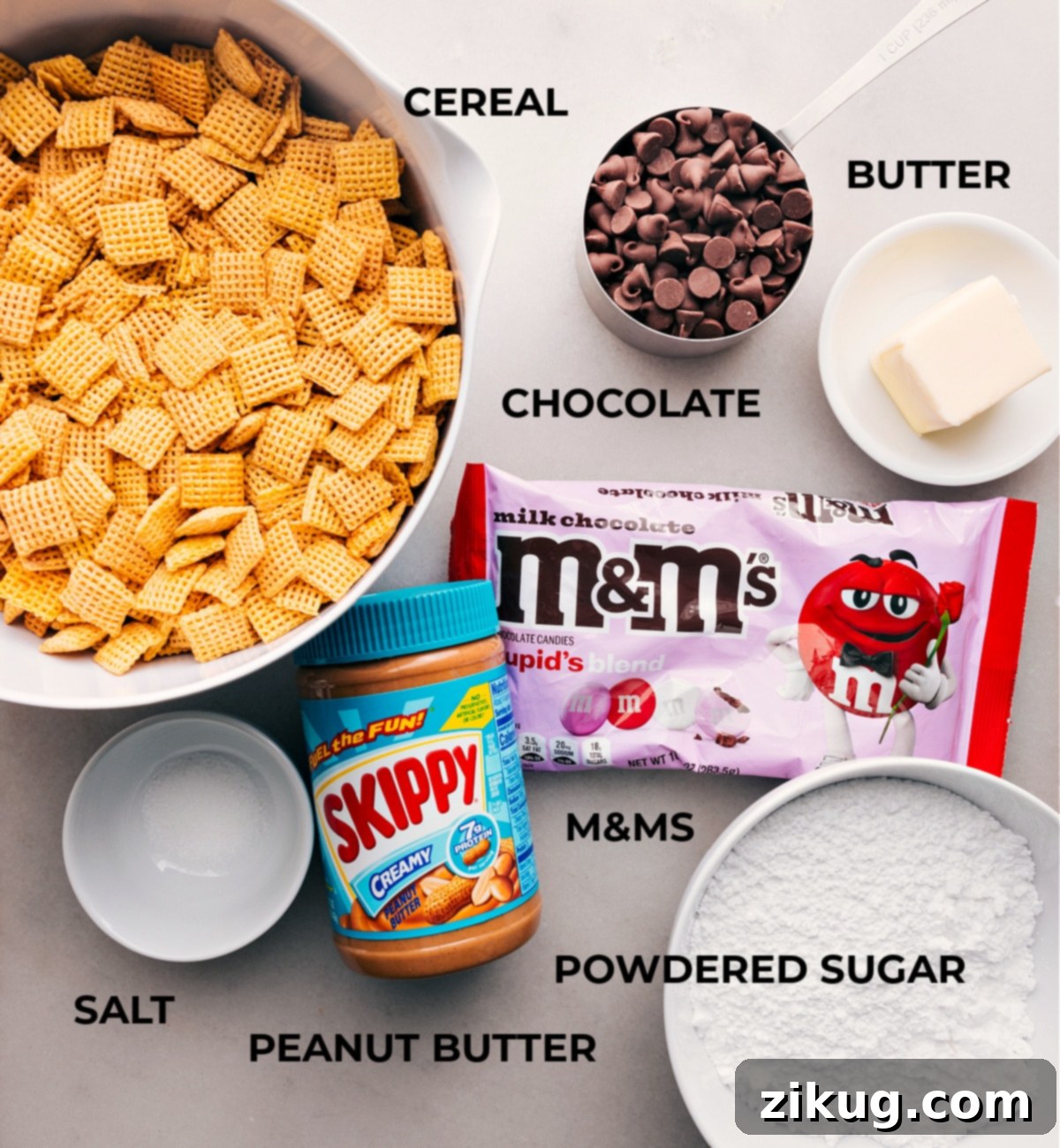 Gathering the Perfect Ingredients for Valentine's Day Snack Mix All the essential ingredients for creating Valentine Muddy Buddies, meticulously laid out on a clean surface for easy and organized preparation.