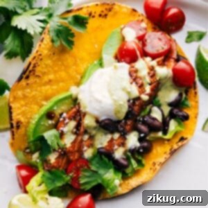 Crockpot Shredded Chicken Tacos ready to be enjoyed with fresh toppings.