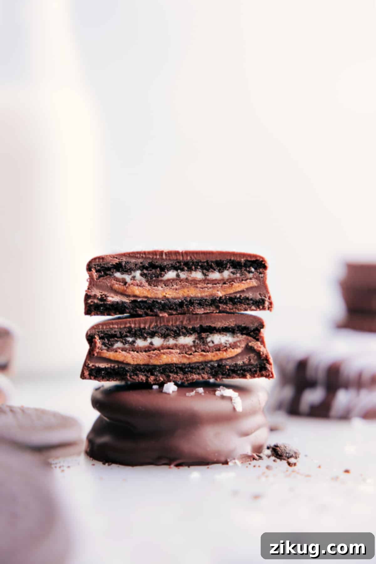 The Best Sweet and Salty Treat Up-close view of the treats stacked on top of each other, showcasing their perfect chocolate coating, ready to be served.
