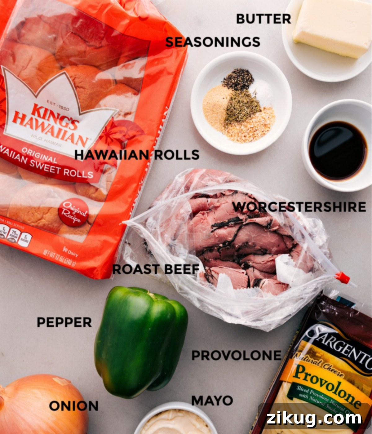 All the fresh ingredients neatly prepped and laid out for easy assembly of Philly Cheesesteak Sliders.