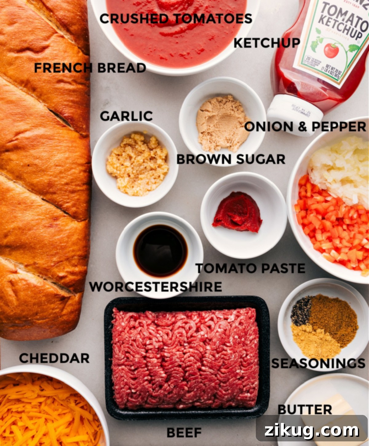 The Essential Ingredients for Sloppy Joe Pizza All the fresh ingredients laid out on a wooden board, ready for making Sloppy Joe Pizza.