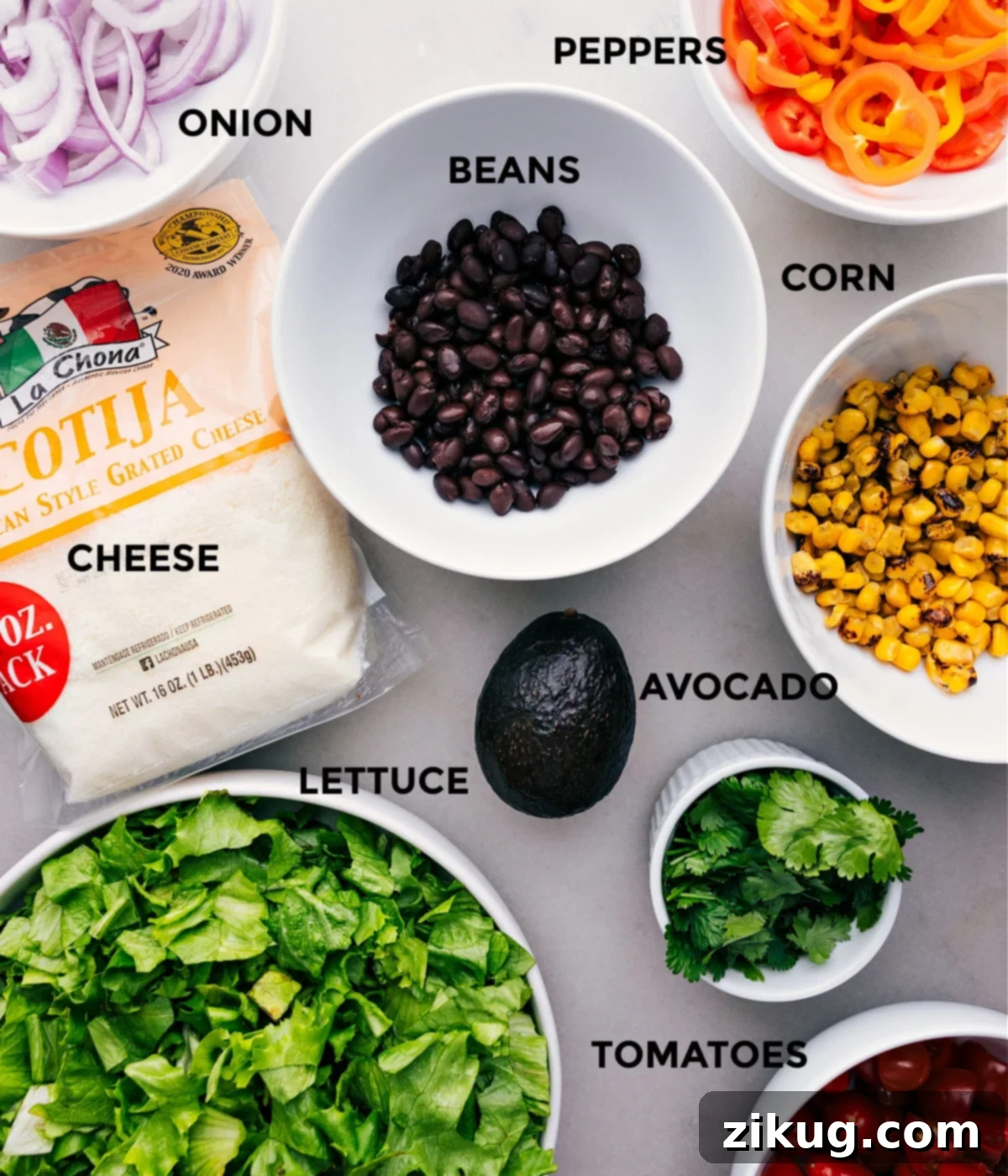 Our Favorite Mexican Salad Ingredients Prepped All fresh ingredients for the Mexican Salad are neatly prepped and laid out on a cutting board, ready for assembly.