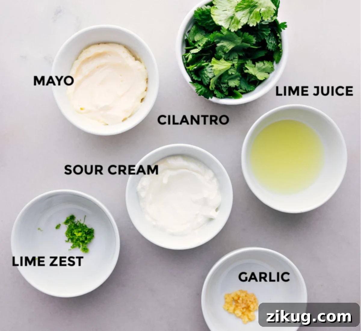 Mexican Salad with Cilantro-Lime Dressing Ingredients All the fresh ingredients for the zesty Cilantro-Lime Dressing, including limes, garlic, cilantro, and jalapeño, neatly arranged.