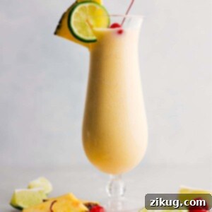 Pina Colada in a glass ready to be enjoyed.