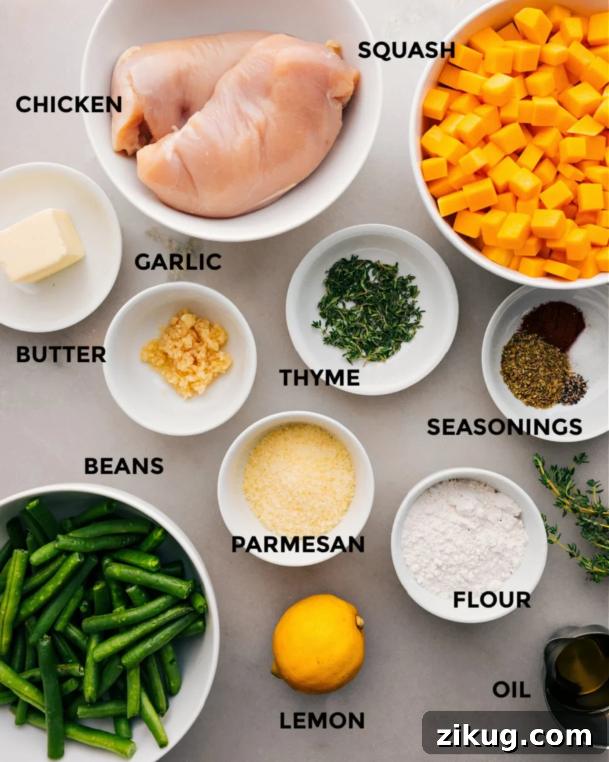Ingredients In Chicken And Butternut Squash Recipe All the fresh ingredients for Chicken and Butternut Squash recipe prepped, including chicken, diced squash, green beans, garlic, herbs, butter, and seasonings.