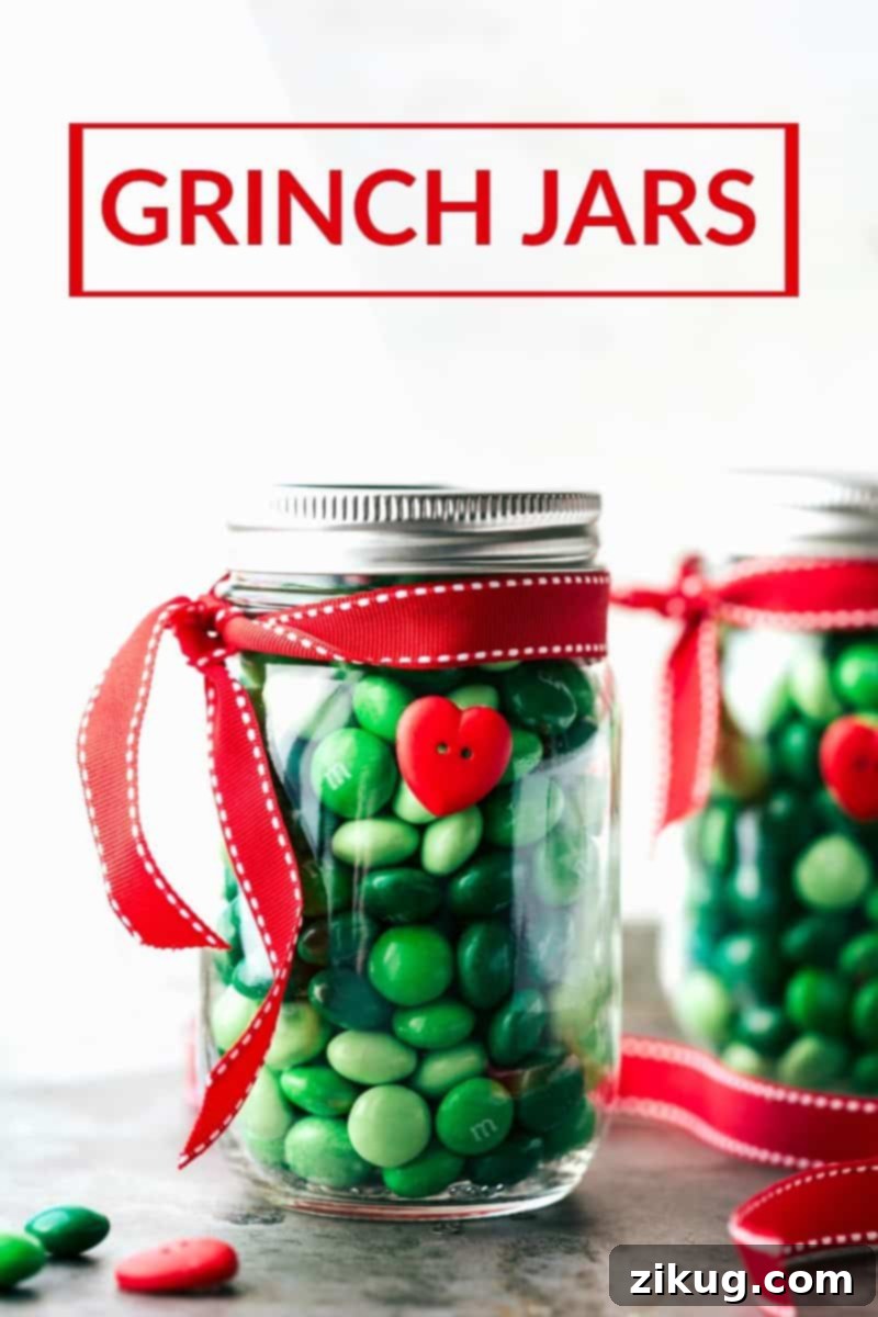 Four easy and creative Christmas mason jar gift ideas: A Grinch jar, Santa jar, Reindeer jar, and Snowman jar filled with various treats. Collection of Grinch themed Christmas mason jar gift ideas filled with green candies, tied with red ribbons and heart buttons.