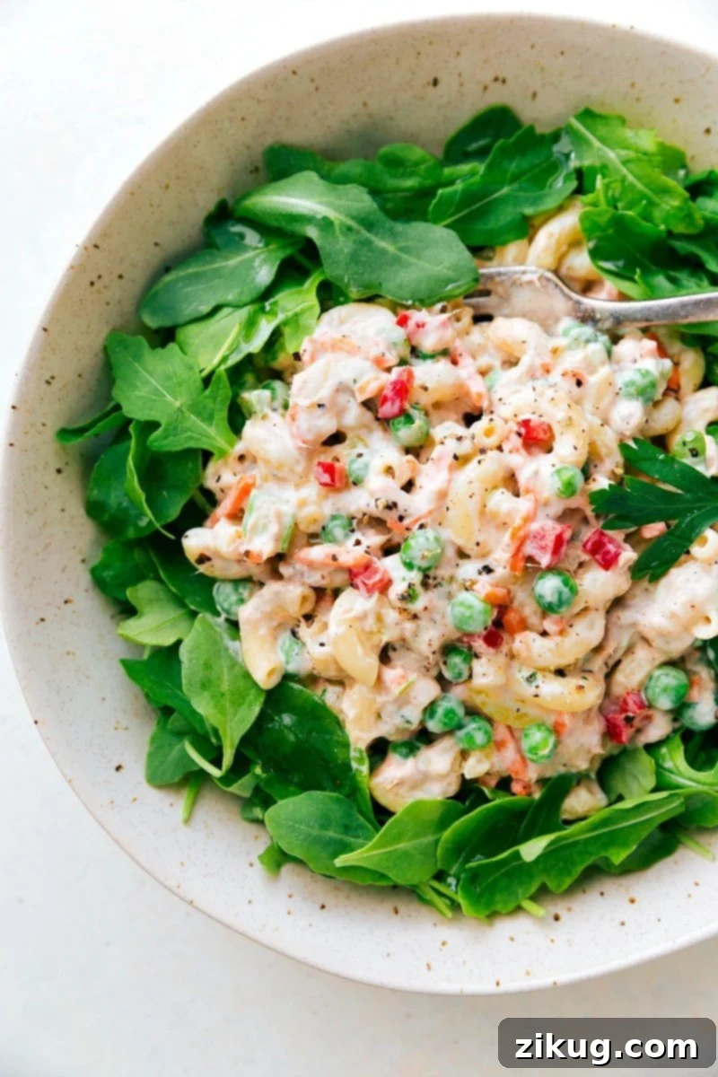 Creamy Tuna Macaroni Salad with fresh ingredients in a large bowl