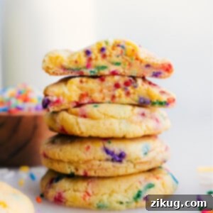 Cake Mix Magic Cookies 2 Cake Mix Cookies stacked on top of eachother.