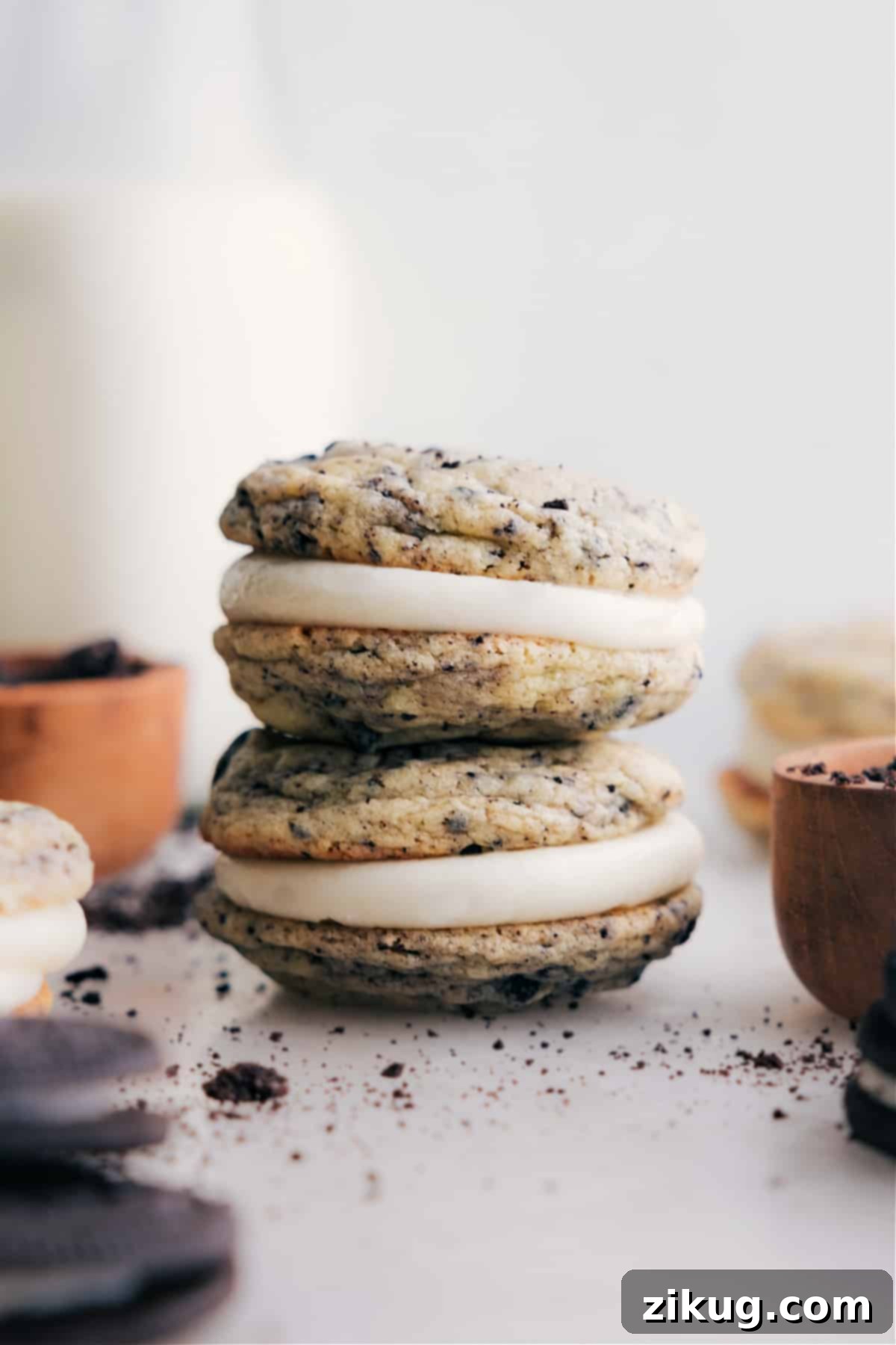 Homemade Oreo Whoopie Pies Recipe Freshly baked Oreo Whoopie Pies stacked on a plate, showcasing their soft, dark chocolate cookie layers and creamy white filling.