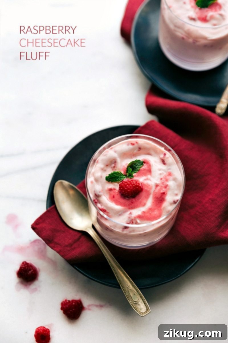 Overhead image of the raspberry fluff in a cup, garnished and ready to be enjoyed.
