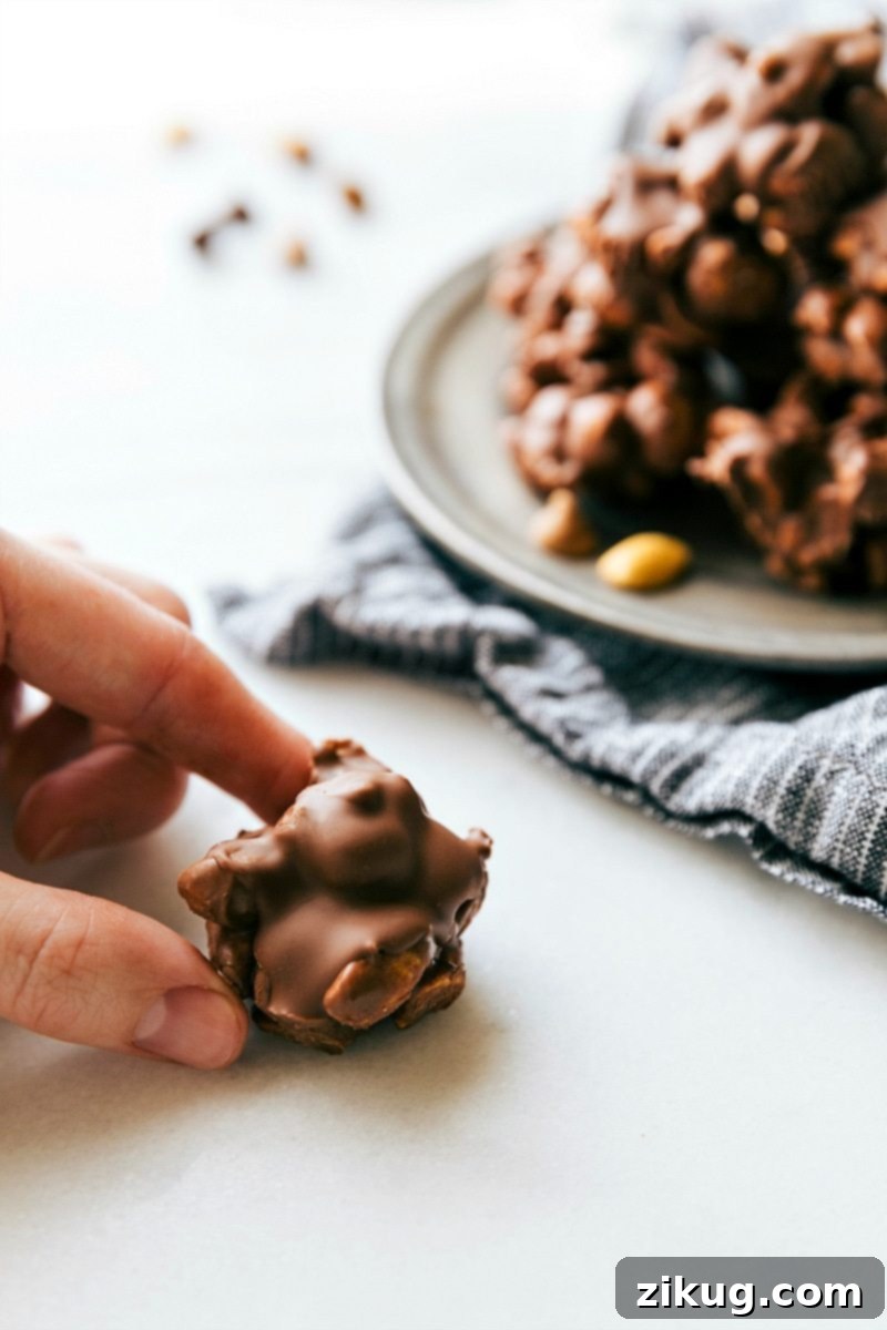 Simple 3-ingredient Easy Peanut Clusters, a perfect no-bake treat combining chocolate, peanut butter chips, and roasted peanuts.