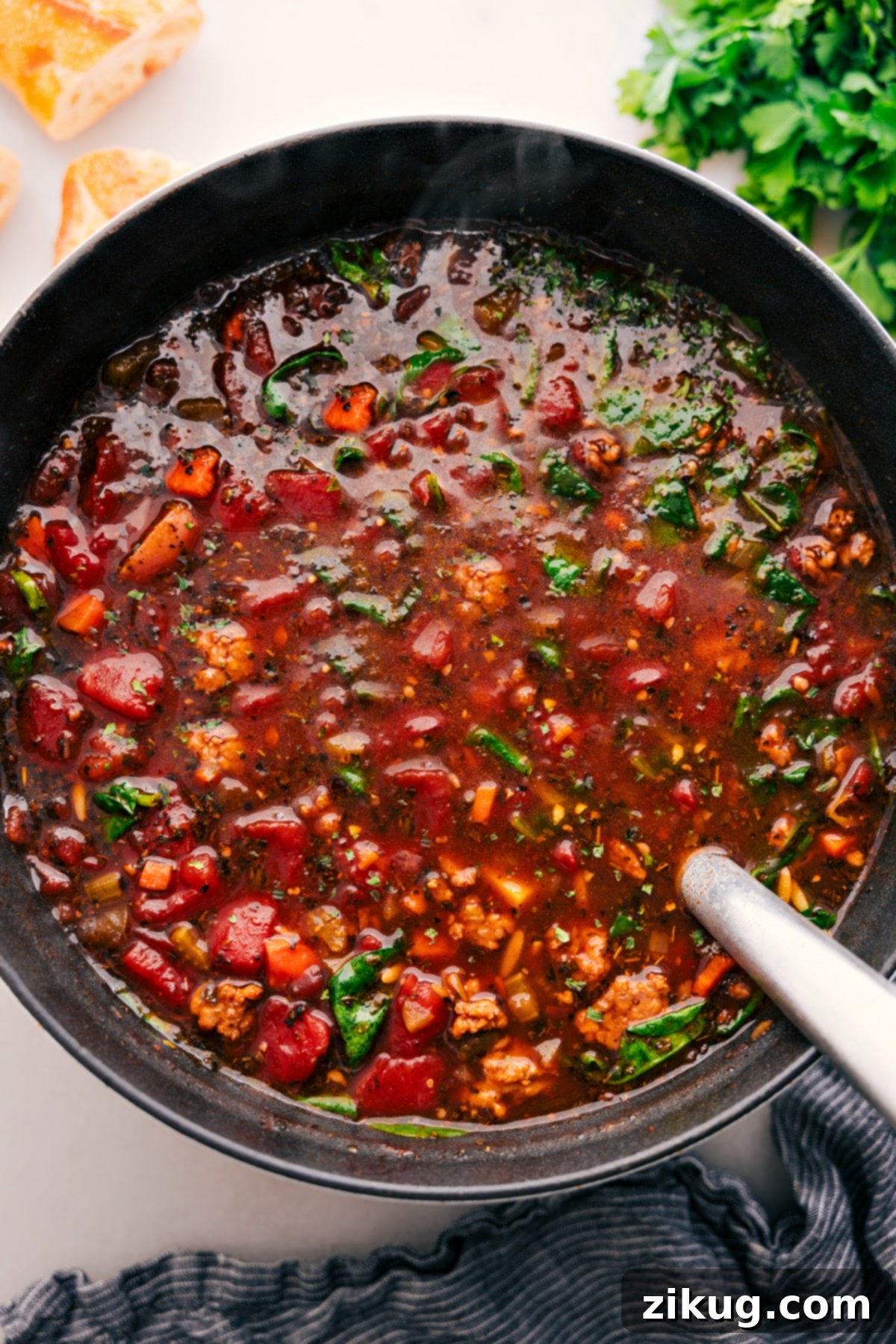 Enjoying This Easy One Pot Italian Sausage Orzo Soup Recipe The fully cooked Italian Sausage Orzo Soup, tender and rich, resting in the pot, ready to be ladled into bowls and savored.