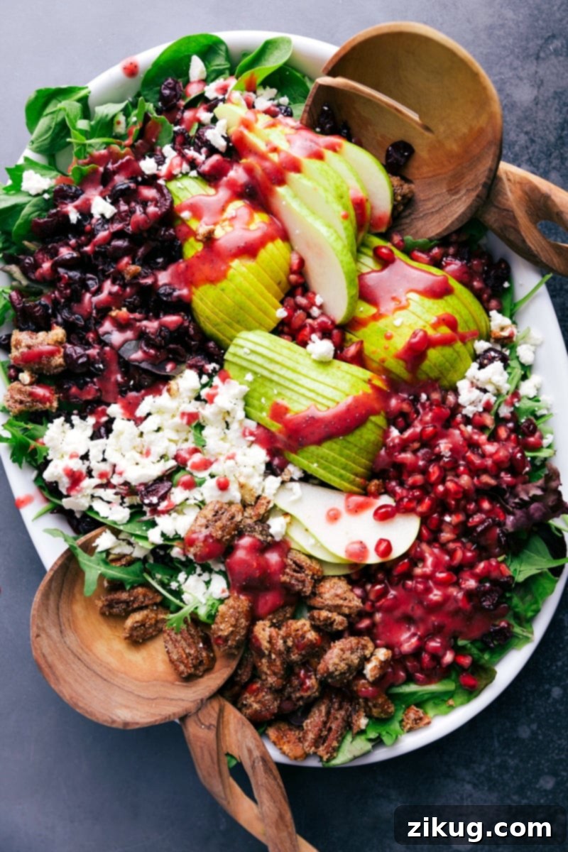 Fresh Pear Salad: Ready to Toss and Delight A vibrant, healthy pear salad, brimming with fresh ingredients, ready to be gently tossed and served as a delicious side dish or light meal.
