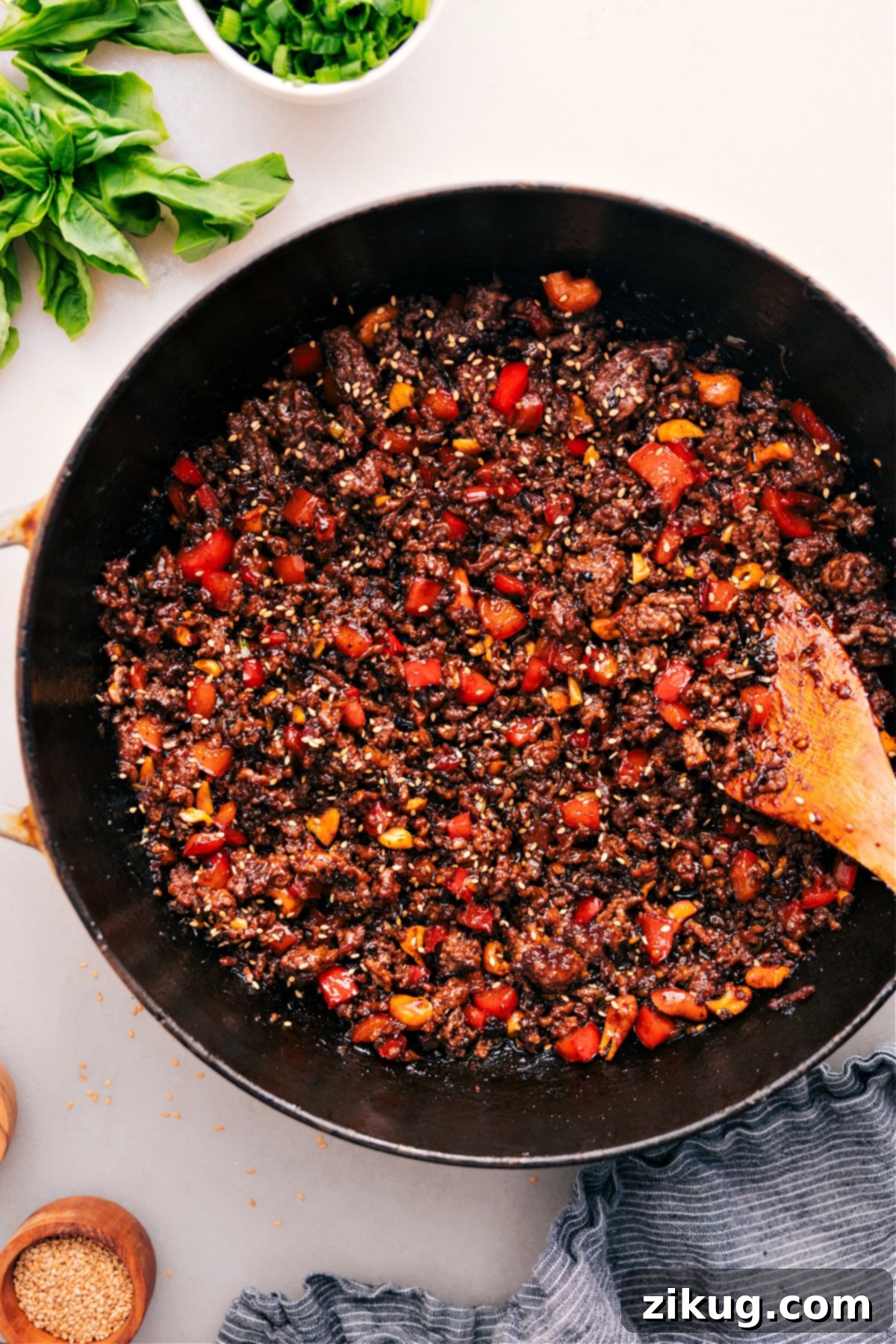The Best Asian Ground Beef Recipe Asian Ground Beef in the pot, topped with sesame seeds and ready to enjoy.
