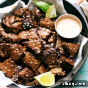 Easy Asian Steak Bites ready to serve with dipping sauce.