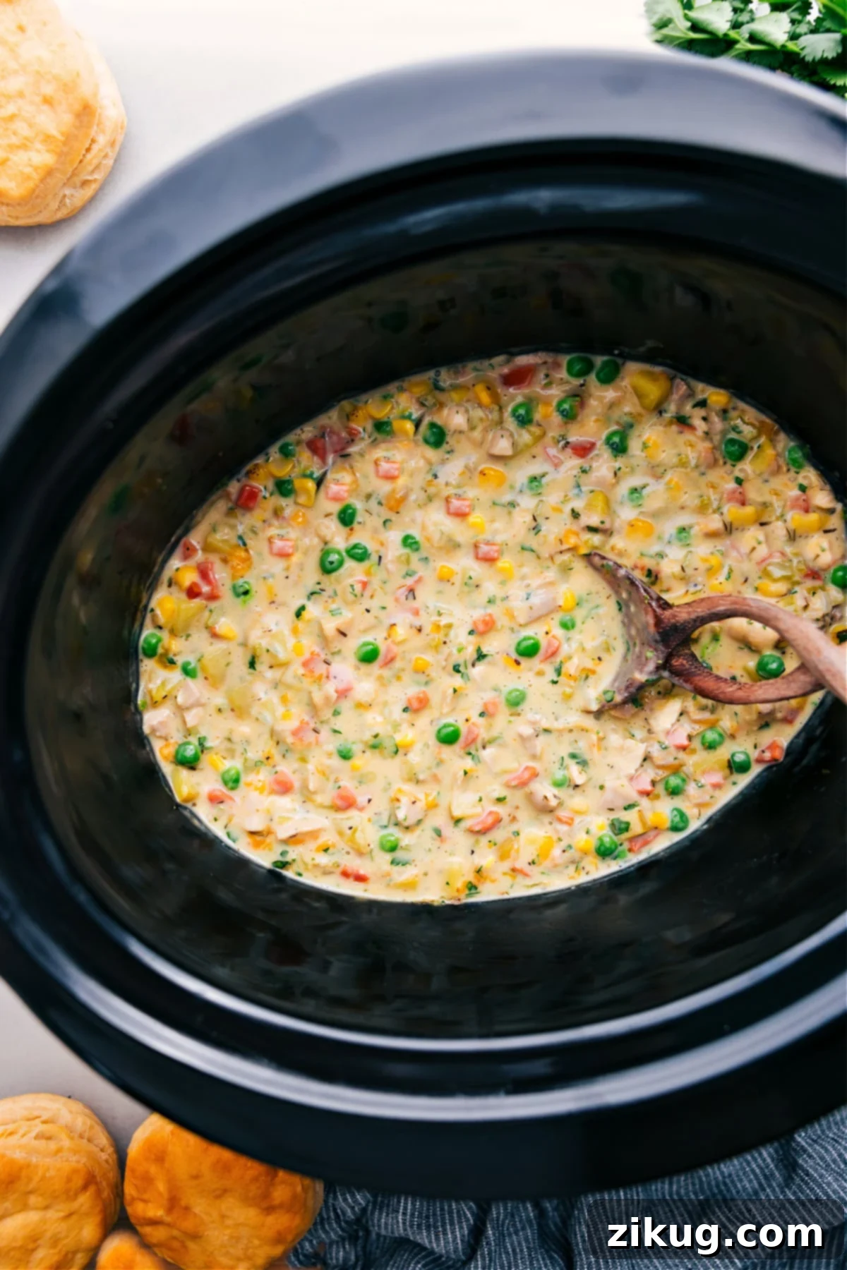 The Best Crockpot Chicken Pot Pie Recipe A delicious Crockpot Chicken Pot Pie, cooked to perfection in the slow cooker, ready to be served and enjoyed with a golden biscuit topping.